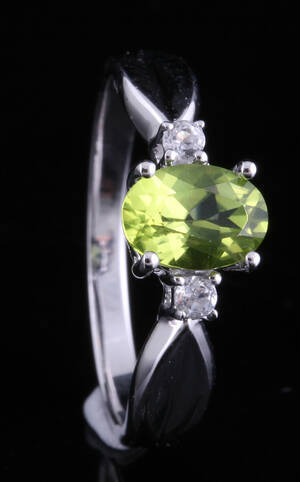 Peridot and topaz ring