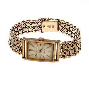 DAMARMBANDSUR, Omega Ladymatic, 18k guld i länk,  totalvikt 46,5 gram.