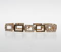 ARMBAND MED VITA STENAR, 14k guld, vikt ca 11,7 gr.
