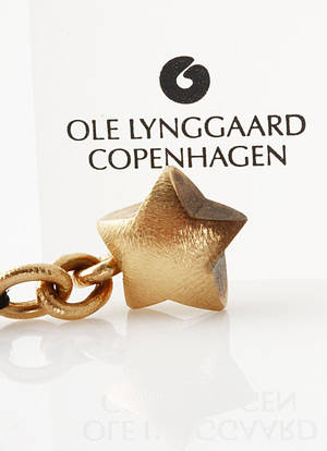 Ole Lynggaard. Charm med stjerne af 14 kt. guld