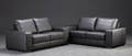 Et par moderne 2½ personers sofaer betrukket med sort læder, model Madrid 2