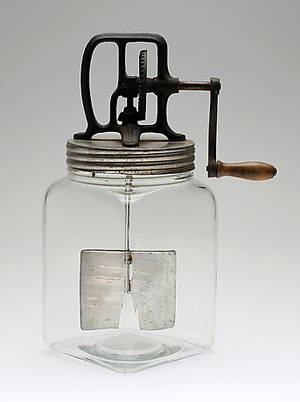 GLASSMASKIN, glas samt metall, 1900-talets första hälft.