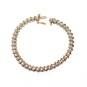 ARMBAND, 18k guld med diamanter, totalt ca 2,0 ct. Vikt 16,5 gram.