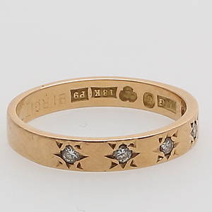 RING, 18K gulguld besatt med 5 diamanter, ca 0.2 carat, vikt 3,25 gram.