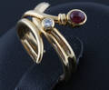 Ring in 18k gold set with diamonds .
