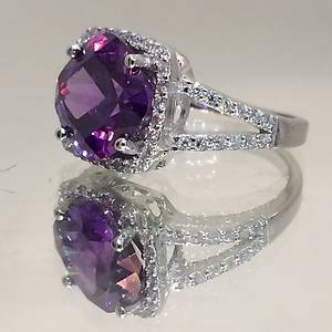 LARGE PURPLE RING.