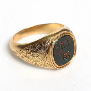 SIGNETRING, 18k guld med hematit, Gustaf Edvard Rydberg, Vänersborg, 1873. Vikt 9 gram.