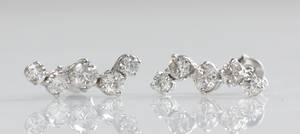 Par brillantørestikker, ca. 1.55 ct. 2