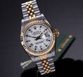 Rolex Datejust. Dameur i 18 kt. guld og stål med dato, ca. 1987