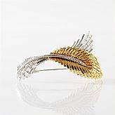 Brosch 18 k rödvitguld diamanter