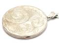 Medaljong med plastdetaljer