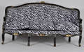 Soffa i rokokostil, klädd i zebrarandigt tyg, 1900 tal