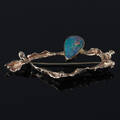 Opal broche i 14 kt. guld