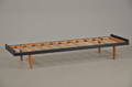 Daybed beklædt med sort skai, ben af bøg, 19501960erne