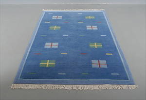 Maskinvävd flossa i ull, Indien