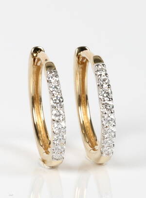 Øreringe Creoler m diamanter, 14 kt guld. Et par. 0.20 ct. 2