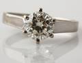 Solitaire ring af 14 kt. hvidguld prydet med brillant, i alt 1,06 ct.