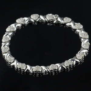 Hjerte armbånd med diamanter.