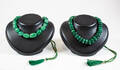 2 halsband med stenar av jadetyp.