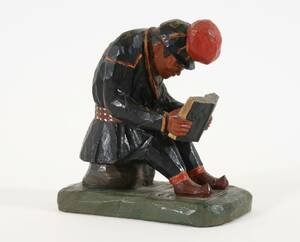 Träskuren och bemålad figur