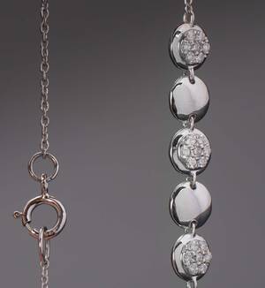 Brillantarmbånd af hvidguld med cirkler, ca. 0,13 ct