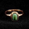 Ring, 18 k. med grön sten