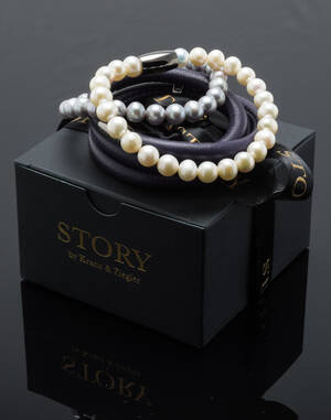 Kranz  Ziegler, 3 STORY armbånd med en charm