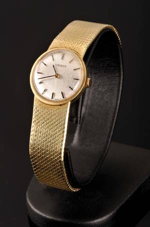 Tissot damearmbåndsur af guld 14 kt.