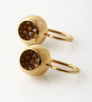 Georg Jensen. Cave. Ørelokker af 18 kt. guld prydet med brillanter, i alt 0.77 ct. 2