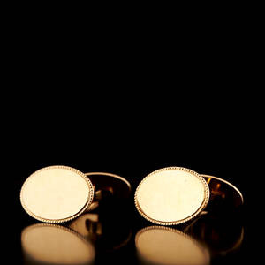 Manschettknappar guld 