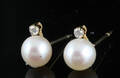 Pearl earrings with a diamond  9k gold 
