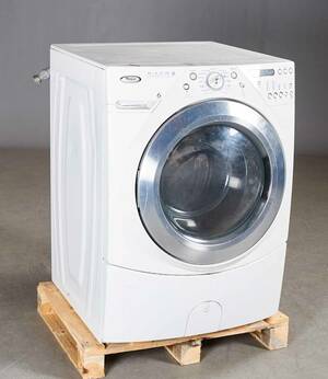 Industrivaskemaskine mærket Wirlpool AWM 1011