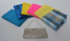 En samling diverse thaisilke samt håndtaske. 7