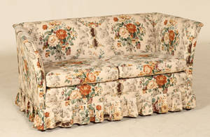 2-personers sofa med blomsteret stof