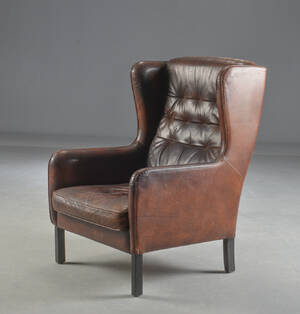 Øreklapstol af læder