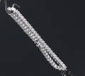 Brillant tennisarmbånd af 10 kt. hvidguld, i alt ca. 1.40 ct