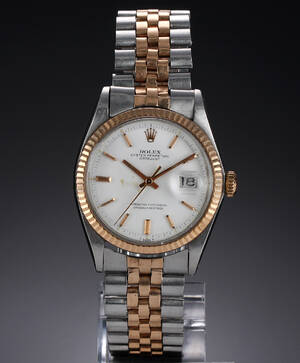 Rolex Datejust. Herreur i 18 kt. rødguld og stål med lys skive, ca. 1968