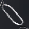 Klassisk brillant tennisarmbånd af 14 kt. hvidguld, i alt ca. 1.70 ct