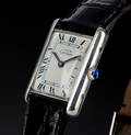 Cartier Tank. Dameur i sterlingsølv med lys skive, 1990erne