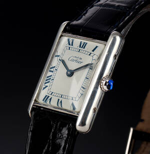 Cartier Tank. Dameur i sterlingsølv med lys skive, 1990erne