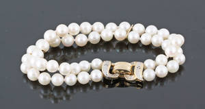 14Kt Diamond and Akoya pearl Bracelet. approx.0.05 ct.