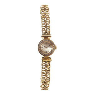 Omega damarmbandsur 18 k guld