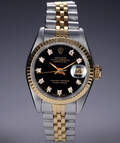 Rolex Datejust. Dameur i 18 kt. guld og stål med sort brillantbesat skive, ca. 1987