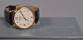 Certina quartz dresswatch  herreur i 18 kt. guld.