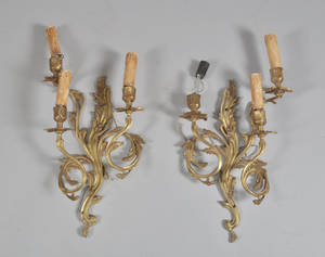 Ett par vägglampor i rokokostil