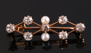 Broche af 14 kt guld, ca 1.20 ct.