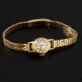 Damarmbandsur 18 k guld