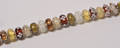 20 Charlotte Borgen beads i gyldne og brune nuancer 20