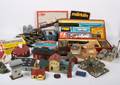 Märklin m.m. To kasser med togbane, vogne, transformer samt kasse med huse.