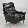 Dansk møbelproducent. Lænestol, sort læder